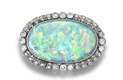 An opal and diamond brooch-pendant, circa 1905