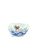 A rare wucai 'dragon and phoenix' peach-shaped bowl, Ming dynasty, Tianqi period