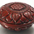 A carved circular cinnabar lacquer 'Lotus' box and cover, Ming dynasty, late 14th-15th century