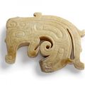 A rare calcified jade 'Dragon' pendant, Late Shang–Early Western Zhou dynasty