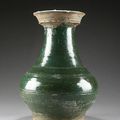 A Chinese green glazed pottery hu vase. Han Dynasty