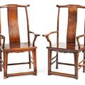 A pair of 'huanghuali' yokeback armchairs, Qing dynasty