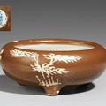 A brown-glazed bulb bowl on three feet, Ming dynasty, 16th-17th century