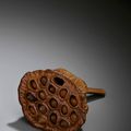 A finely carved boxwood lotus pod, Qing dynasty, 18th-19th century