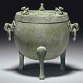 A small unusual bronze ritual tripod food vessel and cover, ding, Han dynasty (206 BC-AD 220) 