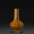 A fluted glass vase imitating realgar, Qianlong mark and of the period