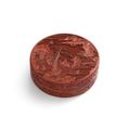 A carved cinnabar lacquer circular box and cover, 17th century