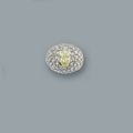 A central oval-shaped diamond of yellowish tone ring