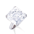 A square cut-cornered diamond ring