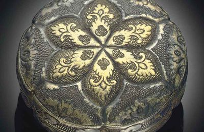 A small parcel-gilt silver circular box and cover, Tang dynasty (618-907)
