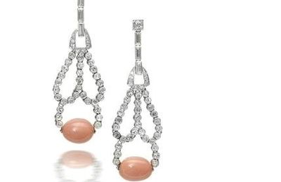 A pair of diamond and conch pearl pendent earrings