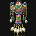 A Qajar gold, enamelled and gem-set eagle-form brooch, Persia, 19th century