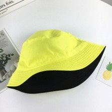 Bob Nation propose le bucket hat réversible jaune fluo