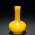 An Imperial-yellow monochrome Peking glass vase. Four-character Qianlong mark