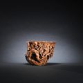 A bamboo 'plum blossom' libation cup, Ming dynasty