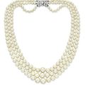 A three-strand natural pearl, cultured pearl and diamond necklace