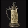 August Neresheimer (1839 - 1939). A fine German silver-mounted carved ivory tankard depicting Diana. Hanau, circa 1880