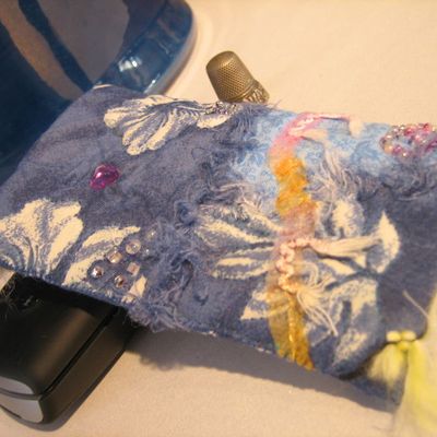 Pochette portable chamarée