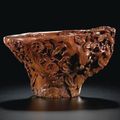 A Finely Carved Rhinoceros Horn 'Bird and Flowers' Libation Cup. Qing Dynasty, Early 18th Century - Sotheby's