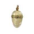 A Fabergé two-colour gold and enamel miniature egg pendant, workmaster: Michael Perchin, St. Petersburg, 1899-1903