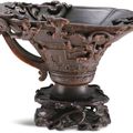An archaistic rhinoceros horn 'chilong' libation cup, Qing dynasty, 17th century