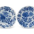 A pair of Chinese porcelain blue and white small molded dishes, Kangxi period (1662-1722)