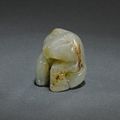 A rare small jade figure of a bear, Shang dynasty