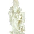A white jade 'lady and crane' group, Qing dynasty, 18th century