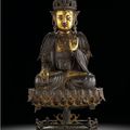A parcel-gilt-bronze figure of a seated Guanyin, Ming dynasty, 16th century