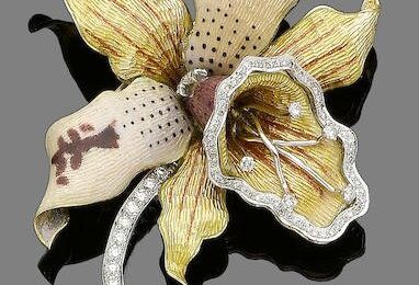 An enamel and diamond orchid brooch