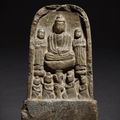 An extremely rare inscribed limestone 'Buddhist Triad' stele, Tang dynasty, dated to the first year of the Wansui Dengfeng period of Empress Wu Zetian (in accordance with 696
