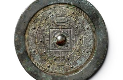 A bronze 'TLV' mirror, Han dynasty