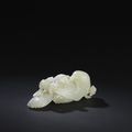 A finely carved pale green jade magpie, Mid-Qing Dynasty