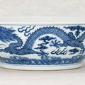 A large blue and white 'dragon' bowl, Daoguang six-character seal mark in underglaze-blue and of the period