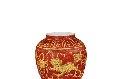 A rare small red and yellow-enamelled 'Buddhist lion' jar, Jiajing six-character mark and of the period (1522-1566)