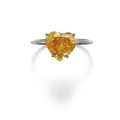 Rare fancy vivid orange diamond ring