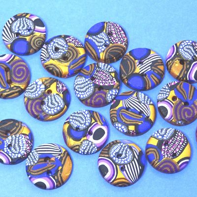 De jolis boutons et broches bleu et or 