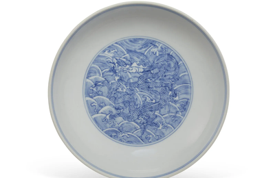 A blue and white 'dragon' dish, Qianlong six-character mark in underglaze blue and of the period (1736-1795)