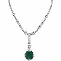 An emerald and diamond pendant necklace by William Goldberg