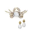 18 karat gold, baroque cultured pearl and diamond brooch and a pair of pendant-earrings