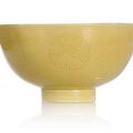 A monochrome yellow encarved bowl, China, Kangxi mark 