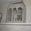 La cage a oiseaux, la porte ouverte ,signe de