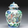 A wucai enameled porcelain covered jar. 17th Century