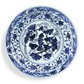 A superb blue and white 'grape' charger, Ming Dynasty, Yongle period (1403-1425)