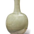 A pale celadon-glazed stoneware bottle vase, China, Sui dynasty (AD 581-618)