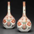 A pair of unusual famille verte bottle vases, Kangxi period (1662-1722)