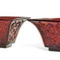 A pair of small Chinese square-form red glass jardinières, early 20th century