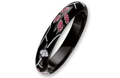 Black jadeite, ruby and diamond bangle, ring and pair of earrings