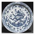 A massive Ming-style blue and white 'dragon' charger. 18th-19th century