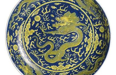 A blue-ground yellow dragon porcelain dish, China, Qianlong seal mark and of the period